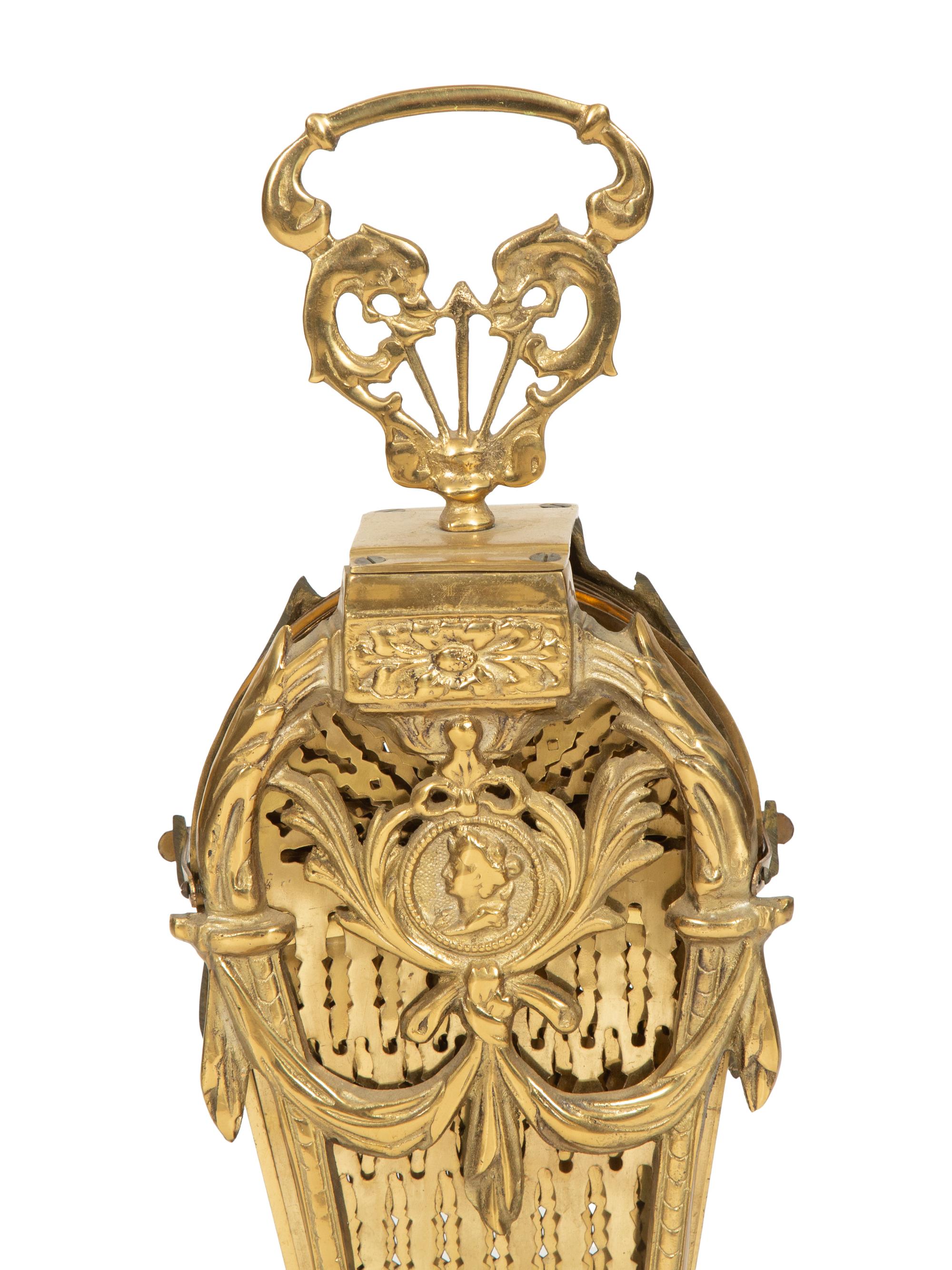 A Louis XV Style Brass Fan-Shaped Fire Screen