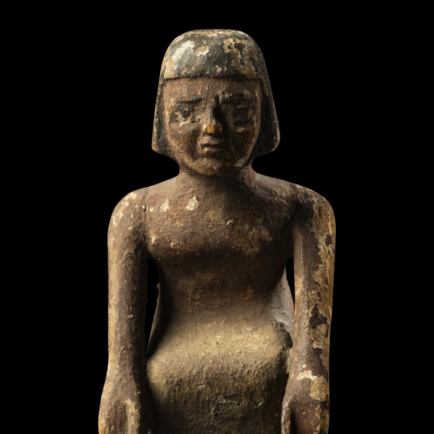 An Egyptian Painted Wood Boatman