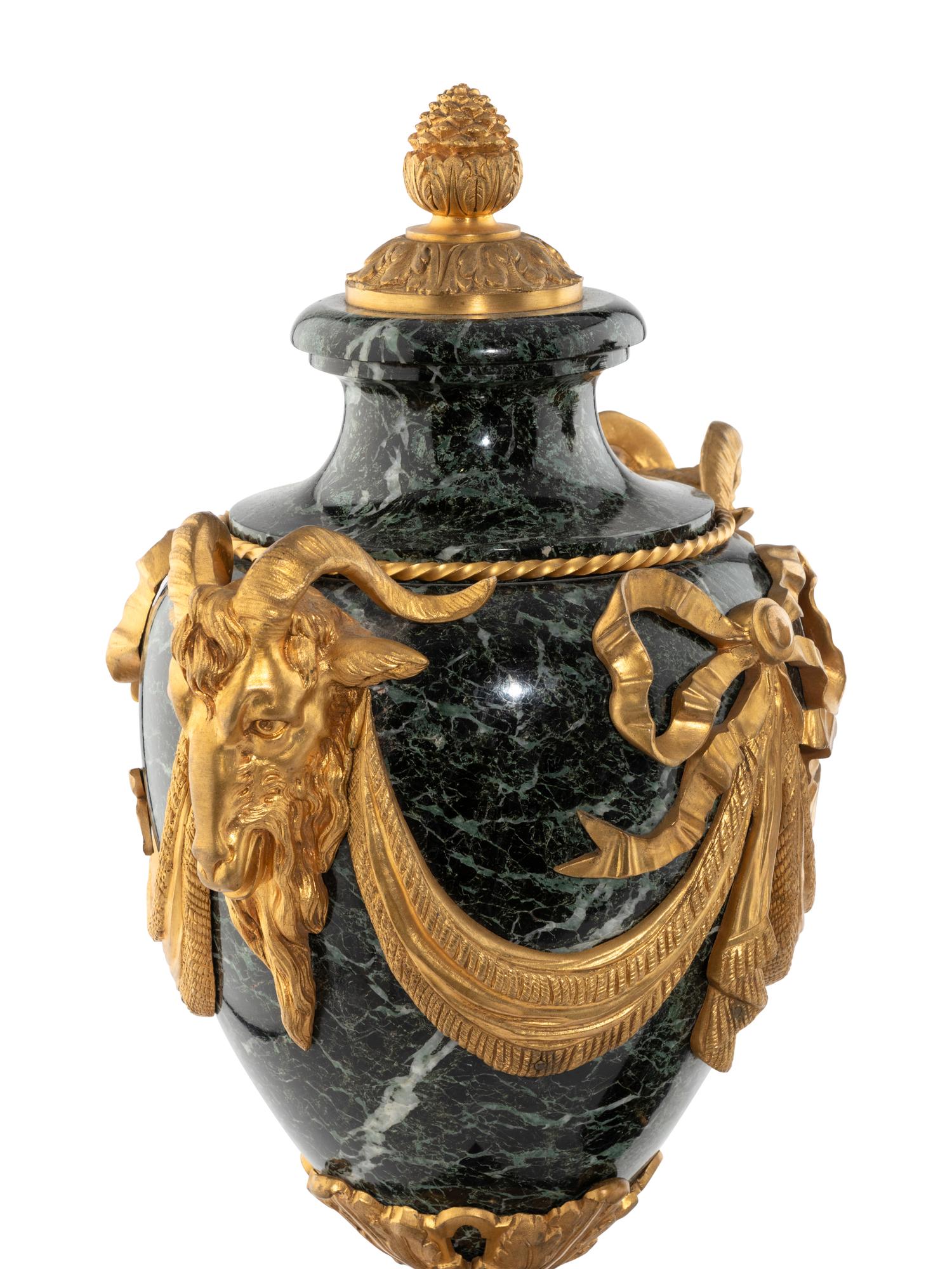 A Pair of French Gilt Bronze and Marble Urns