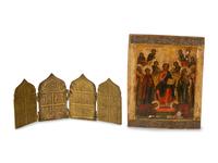 A Painted Russian Icon of Christ Enthroned Surrounded by Saints and a Brass Four-Panel Travel Prayer Icon