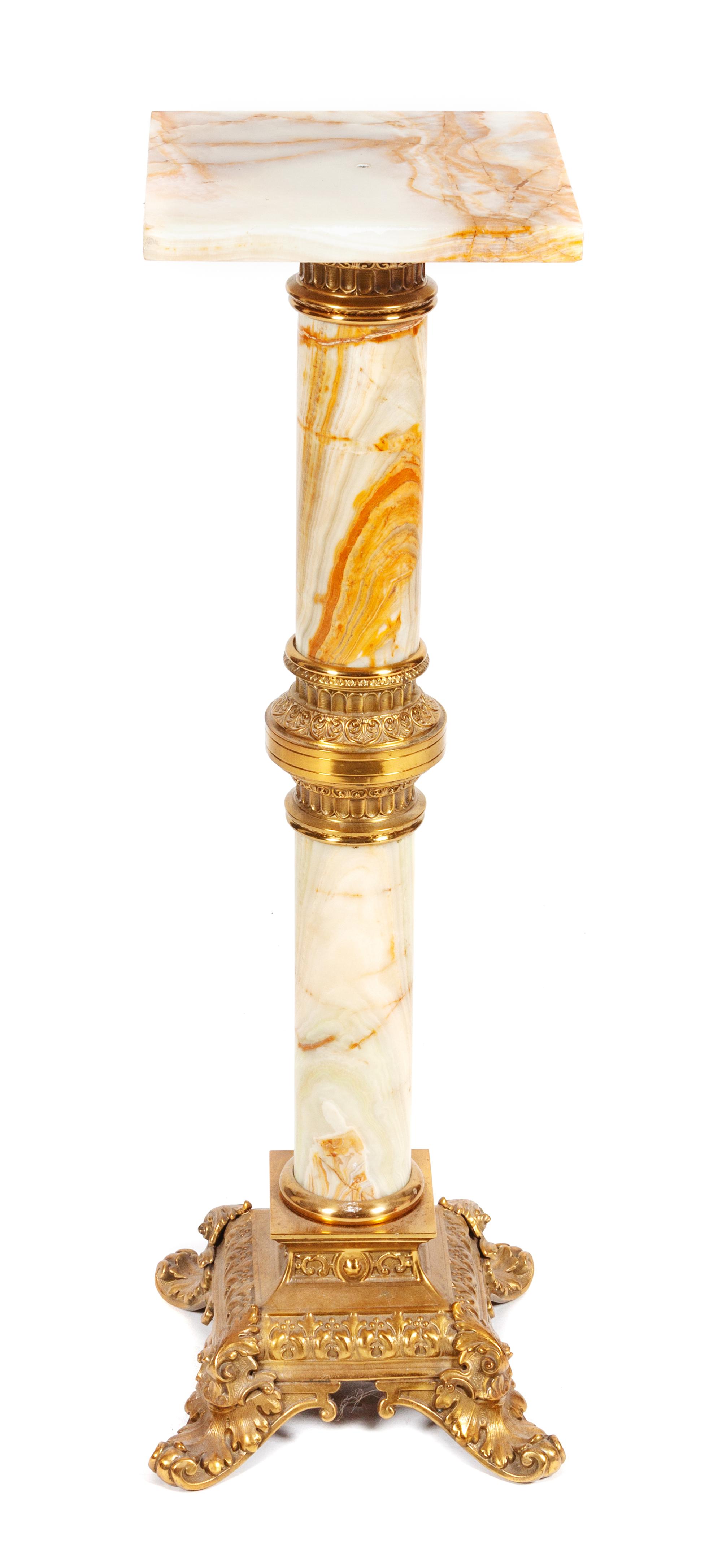 An Onyx and Gilt Bronze Mounted Pedestal Height 38 inches.