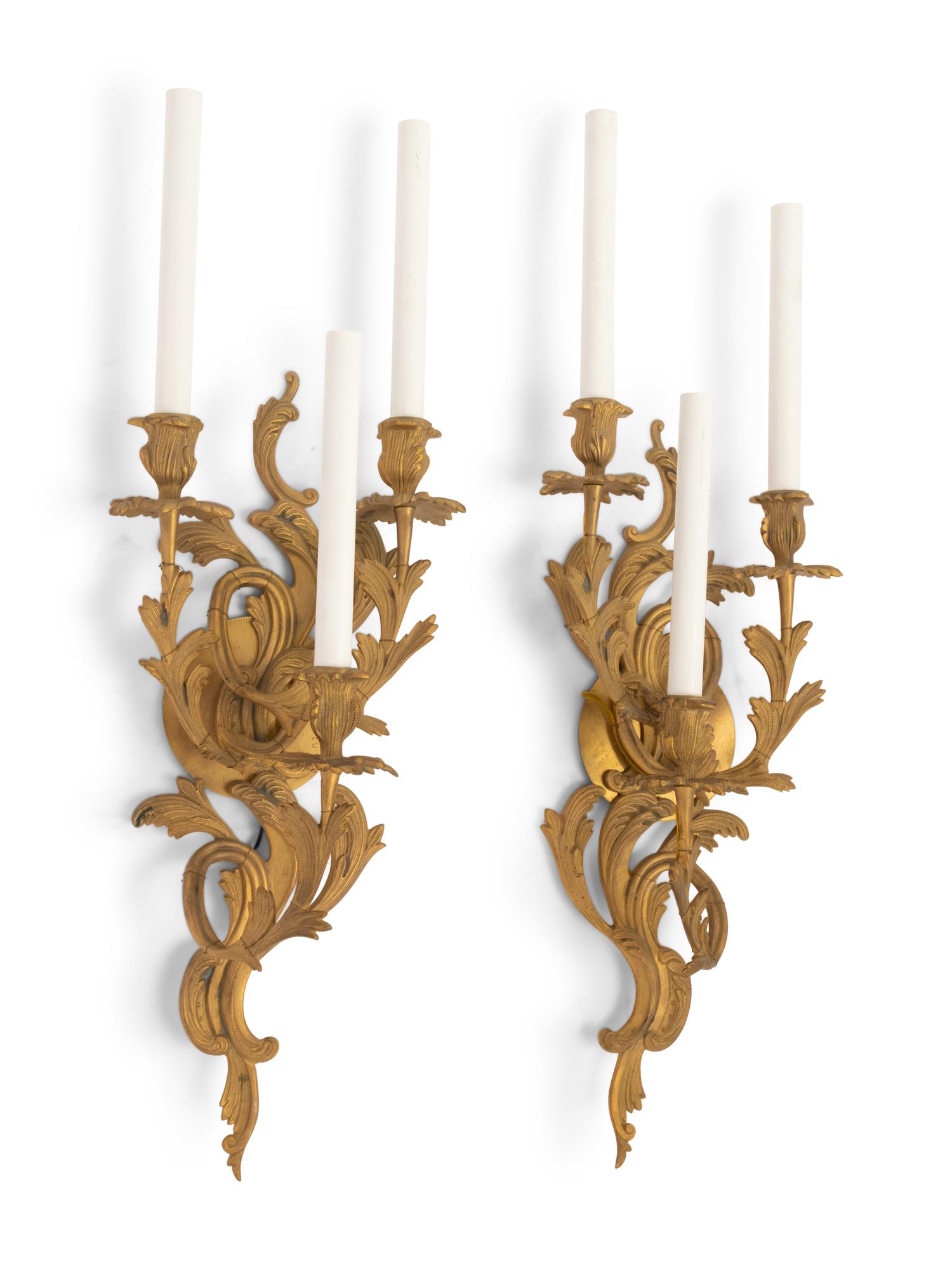 A Pair of Louis XV Style Gilt Bronze Three-Light Sconces