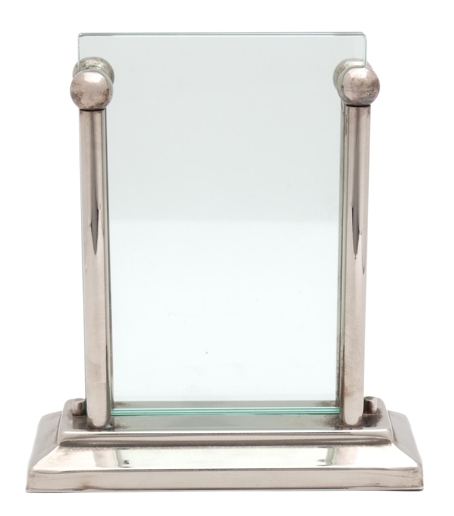 A Silver and Glass Floating Frame Height 7 7/8 x width 7 inches.
