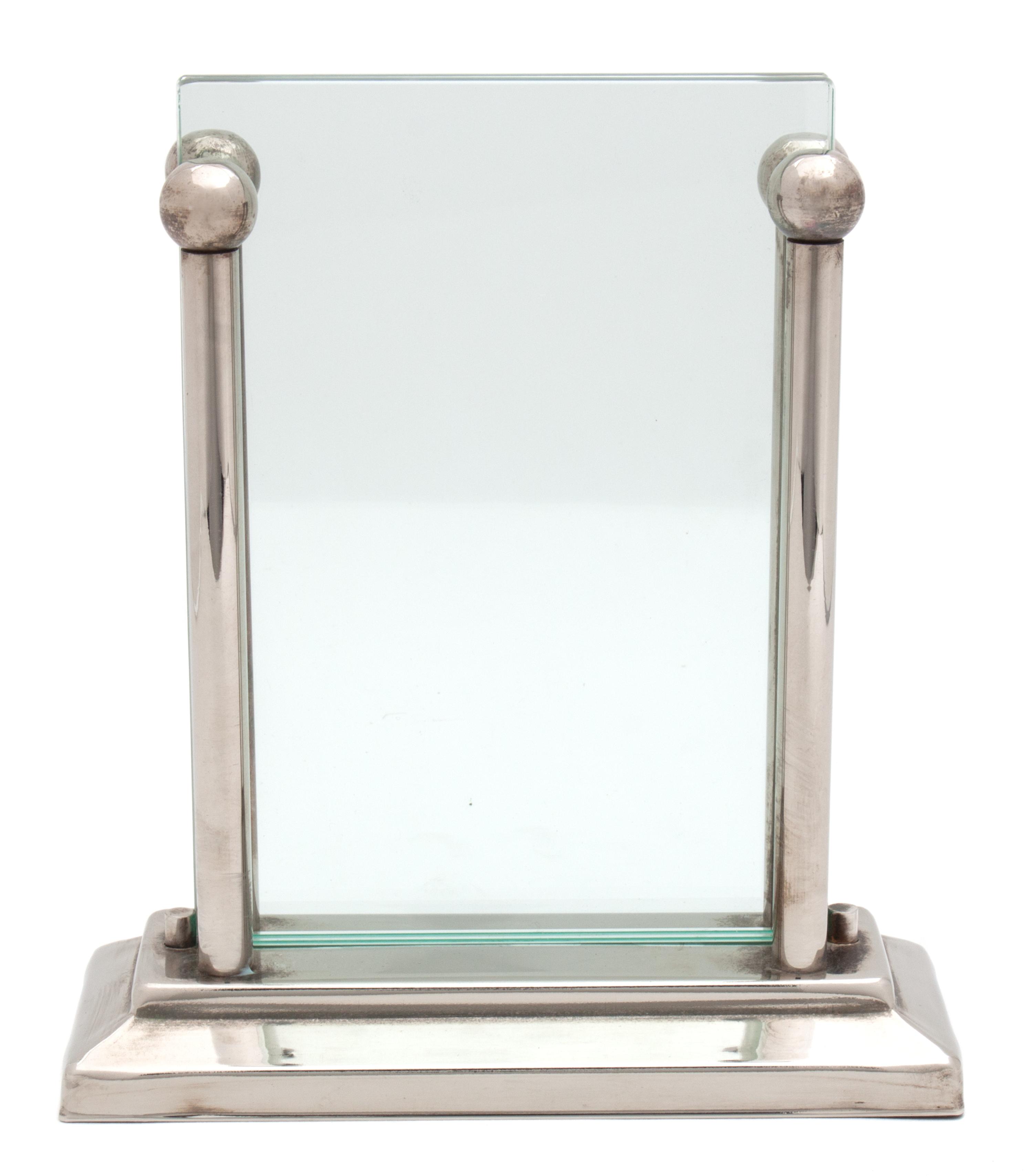A Silver and Glass Floating Frame Height 7 7/8 x width 7 inches.