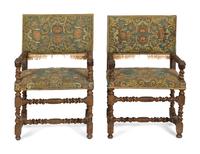 A Pair of Jacobean Carved Walnut Armchairs