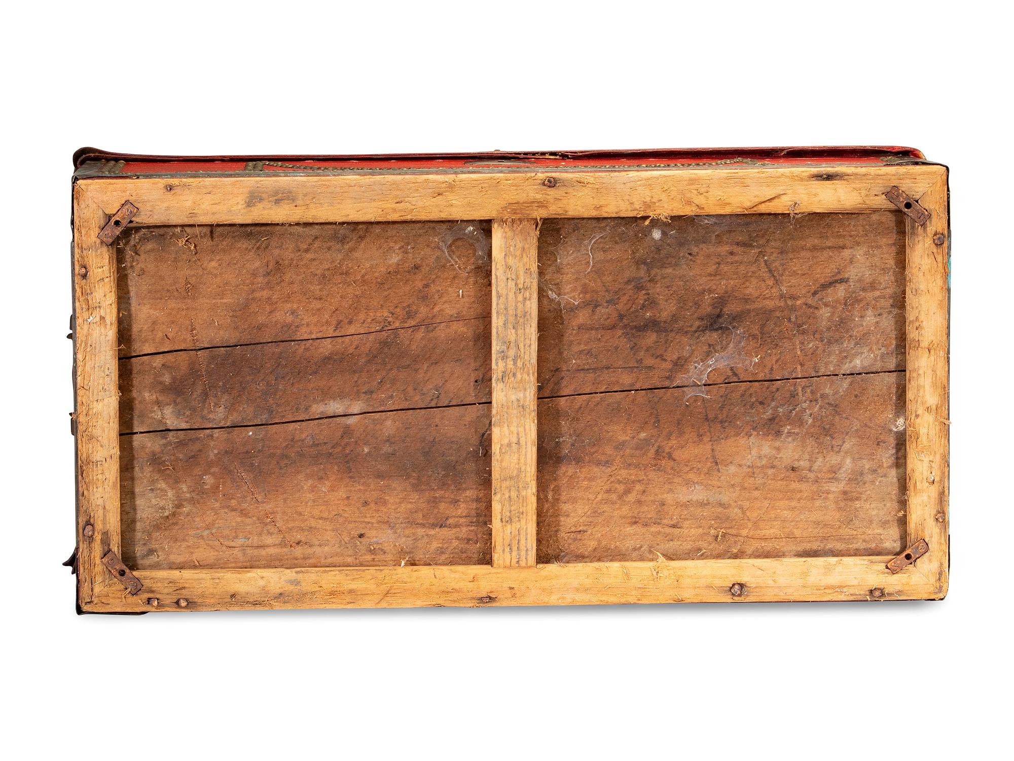 A China Trade Camphorwood Red Leather Clad and Brass Tack-Decorated Trunk