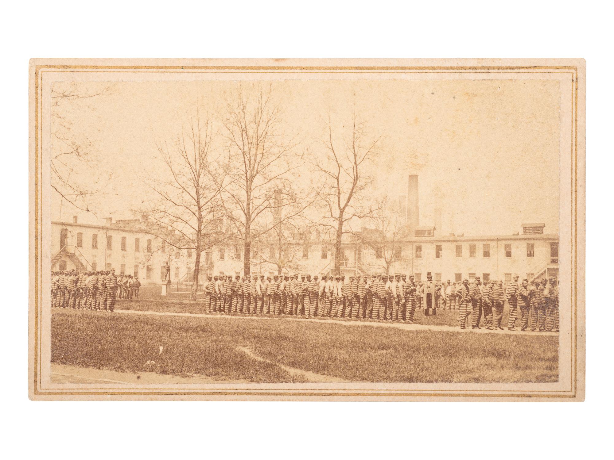 [EARLY PHOTOG.] Prisoners in the Ohio Penitentiary on their way to dinner . Columbus: Wm. Oldroyd.