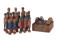 A Set of Painted Wood and Lithographed Military Ten-Pins