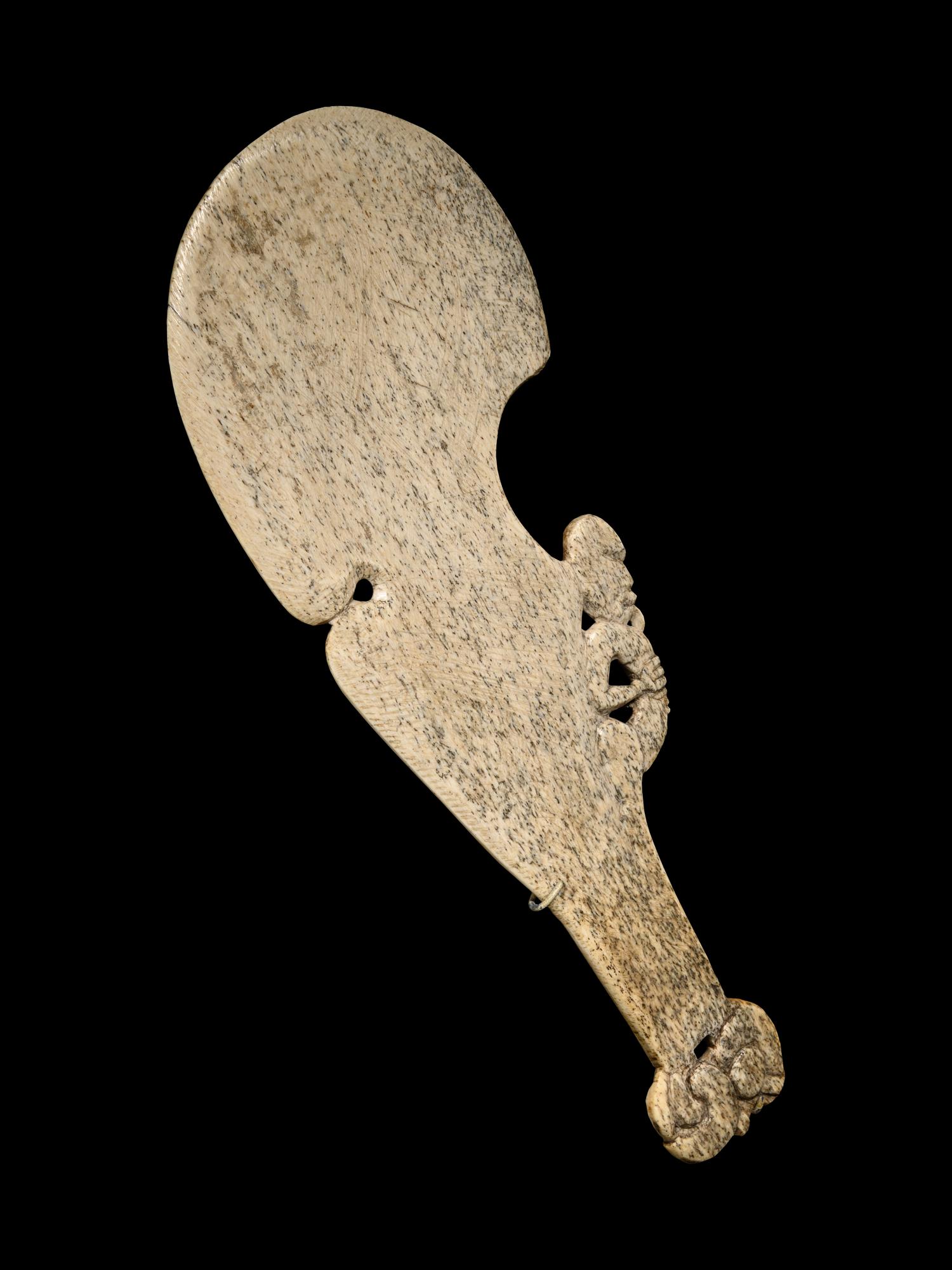 A Maori Whalebone Club (Patu)
