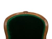Four Louis XV Style Walnut Fauteuils