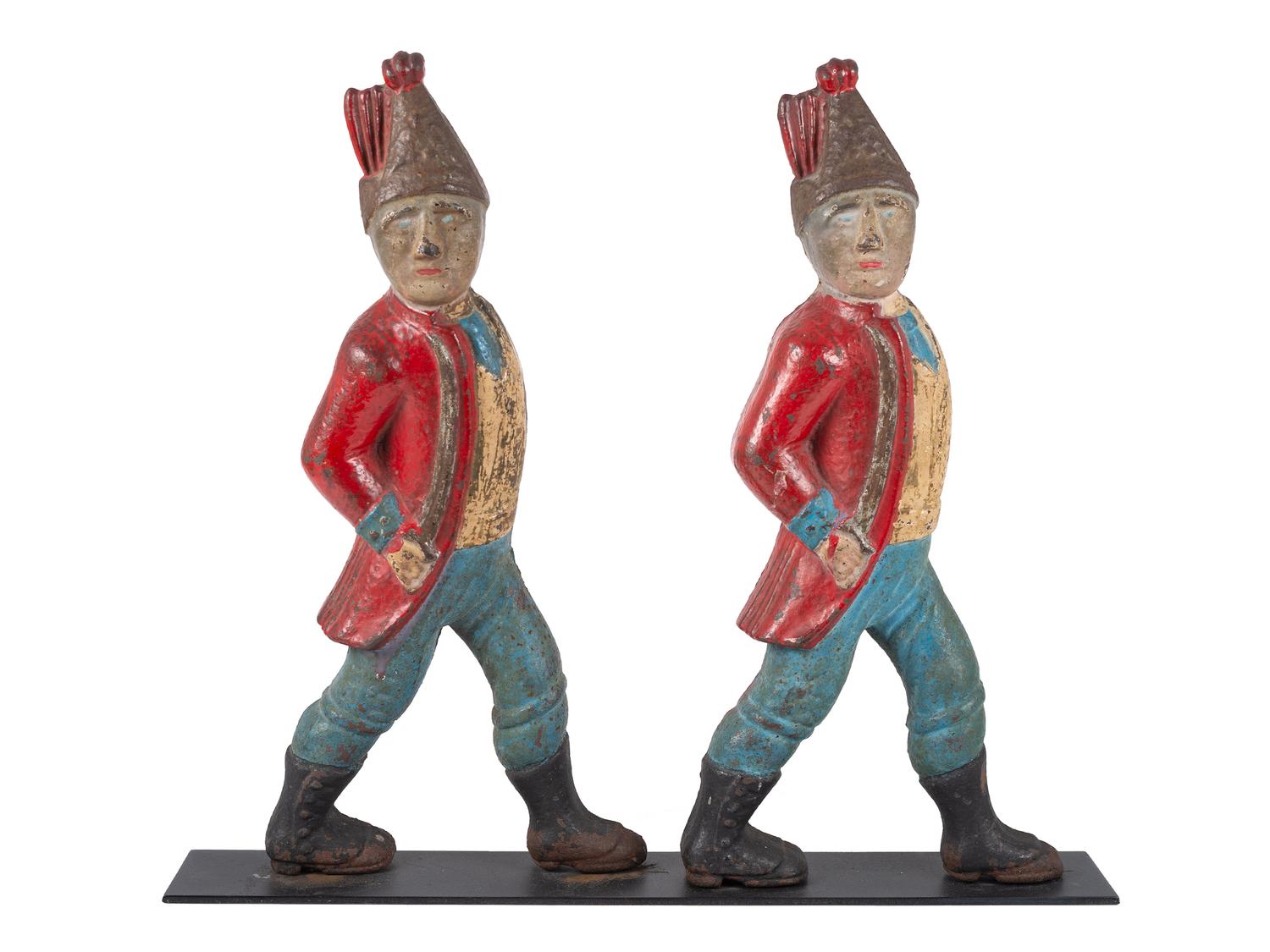 A Pair of Paint Decorated Cast-Iron Hessian Soldier Andiron Supports
