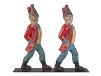 A Pair of Paint Decorated Cast-Iron Hessian Soldier Andiron Supports