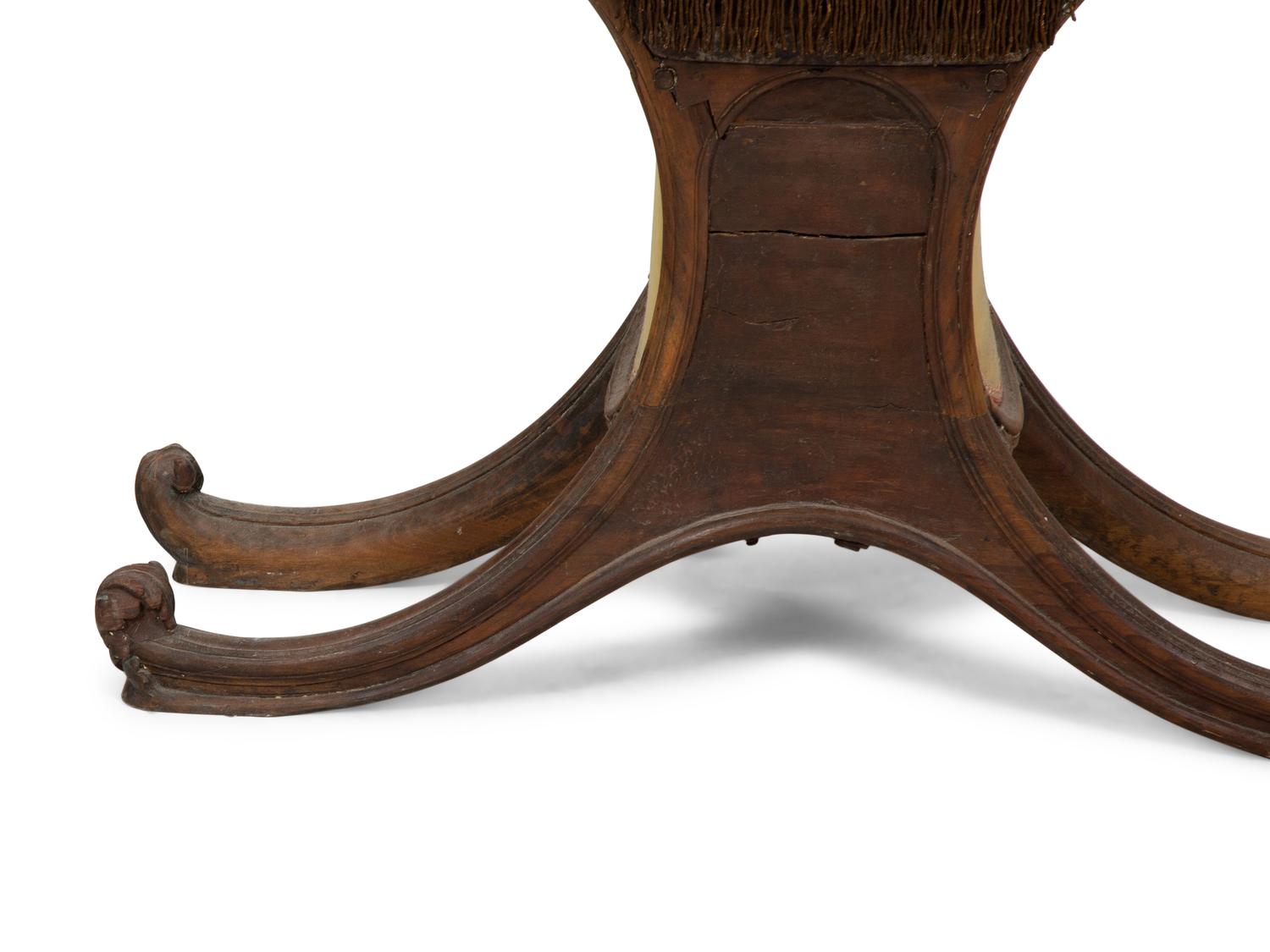 A Venetian Carved Walnut Gondola Chair