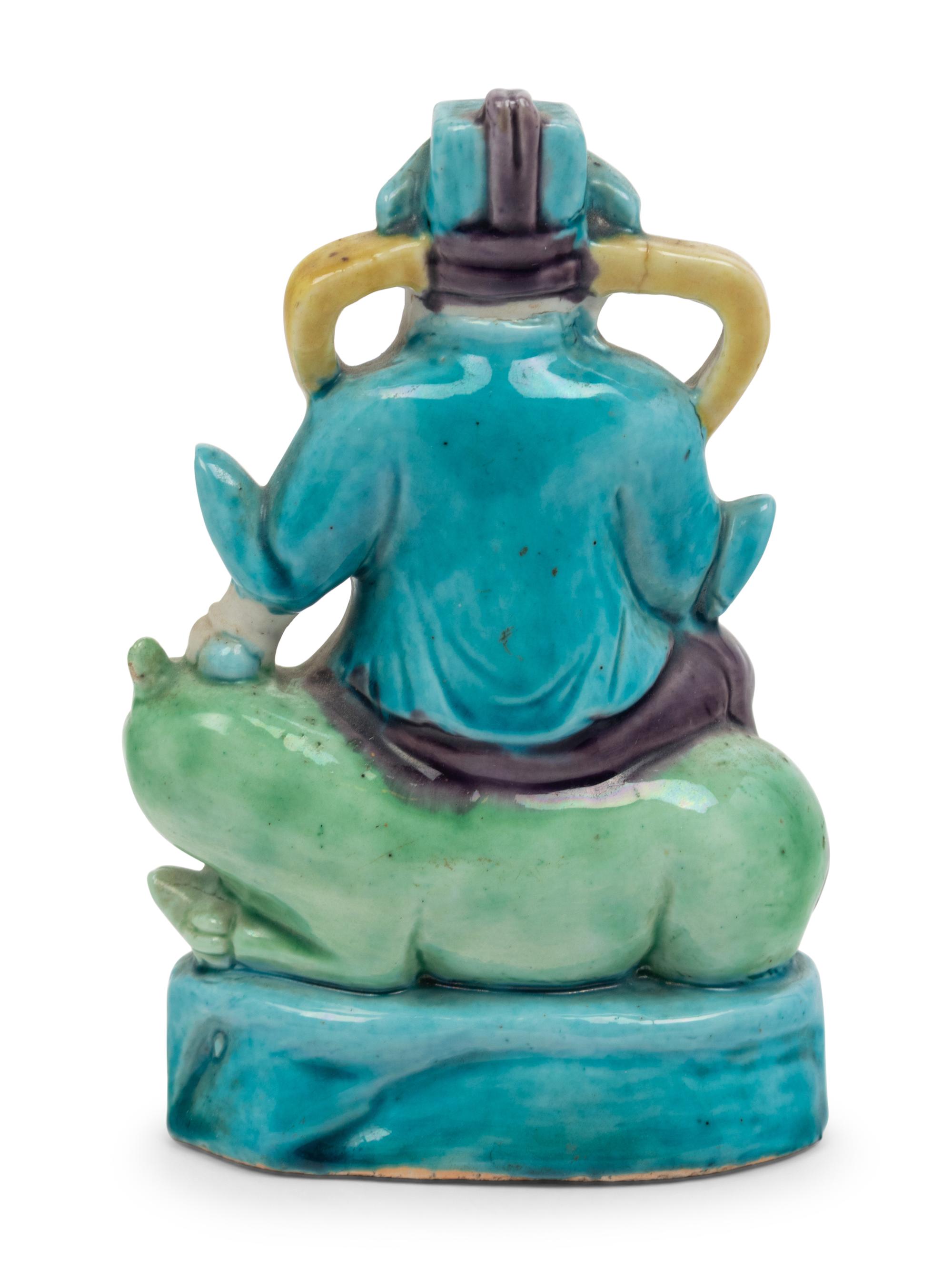 A Chinese Sancai Glazed Porcelain Figure