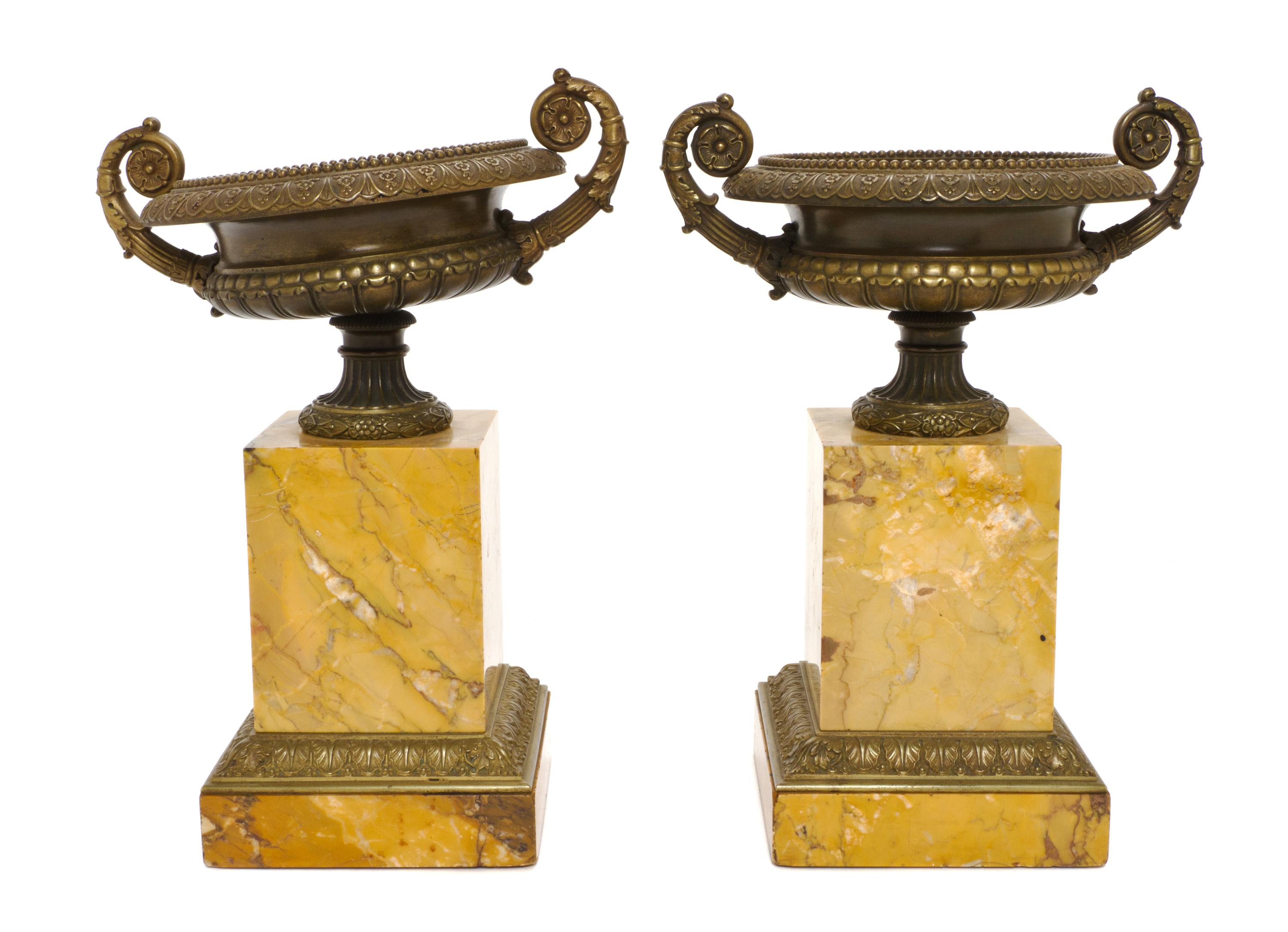 A Pair of Neoclassical Patinated Bronze and Marble Urns, Height 12 inches.