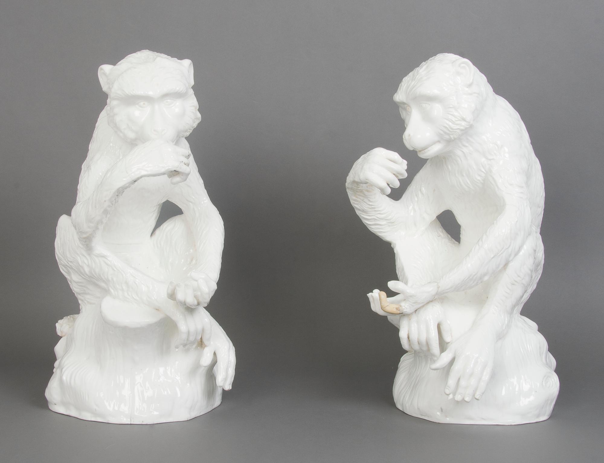 A Pair of Meissen Blanc de Chine Figures of Monkeys, Height 18 inches.