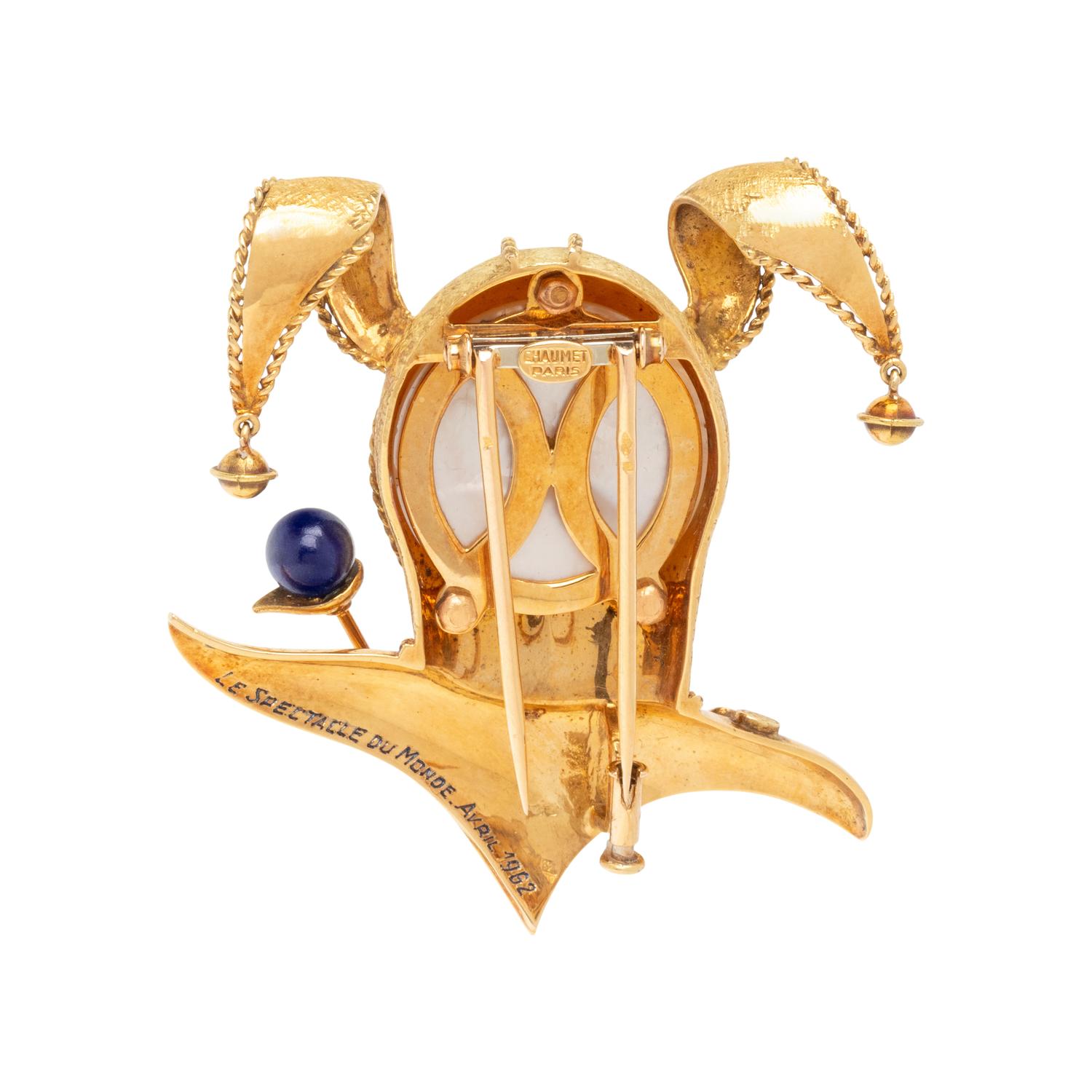 CHAUMET, YELLOW GOLD, LAPIS LAZULI, AND MOTHER-OF-PEARL 'LE SPECTACLE DU MONDE' HARLEQUIN BROOCH