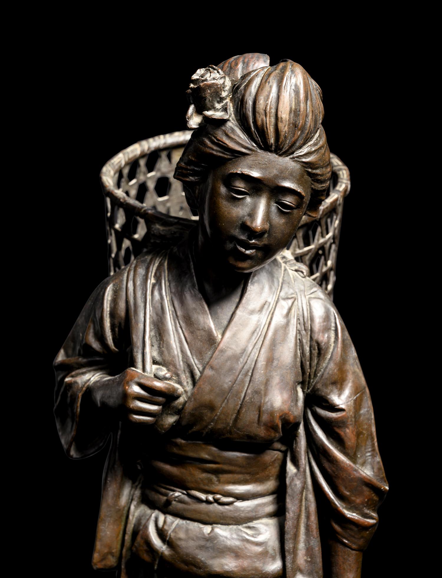 A Bronze Okimono of a Lady