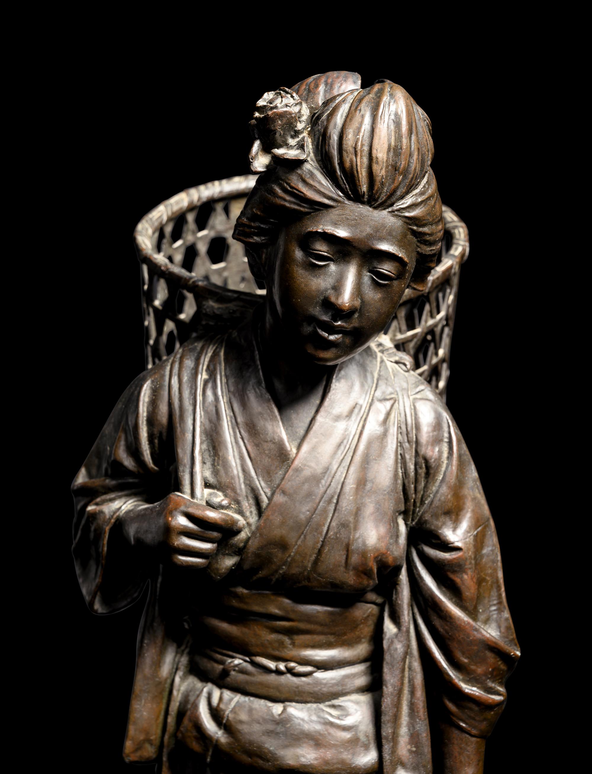 A Bronze Okimono of a Lady