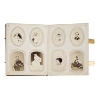[Civil War]. A group of Civil War-era CDV albums and post-war reunion badges.