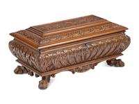 An Italian Carved Walnut Miniature Cassone or Table Casket
