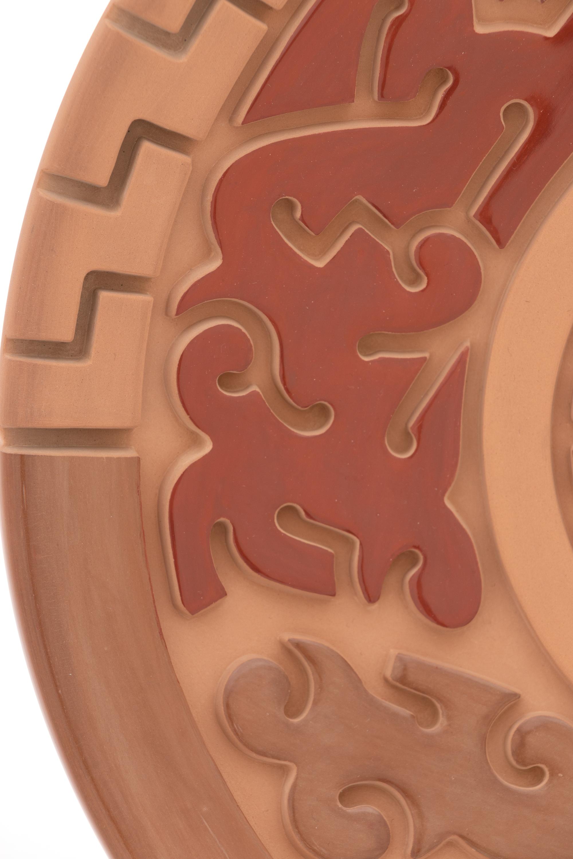 Carved Red and Sienna Pottery Plate