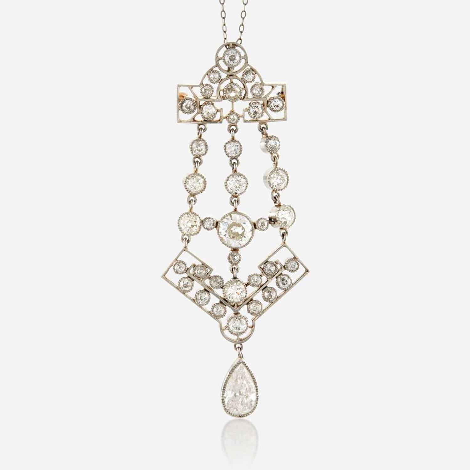 A diamond and platinum topped gold pendant