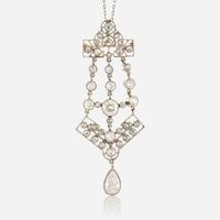 A diamond and platinum topped gold pendant