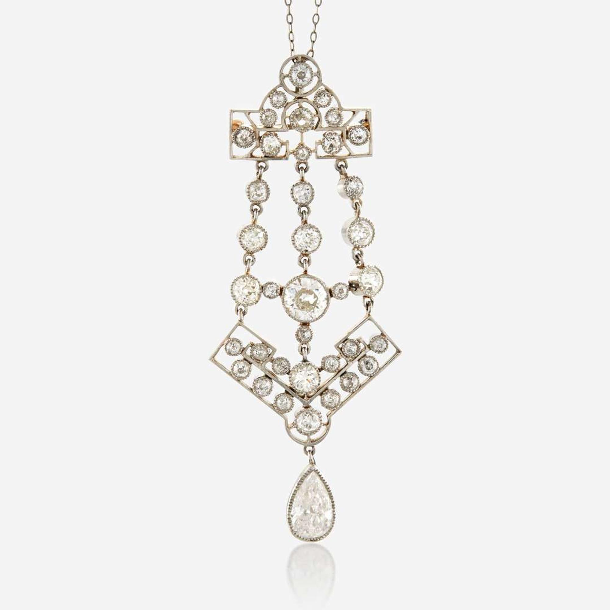 A diamond and platinum topped gold pendant