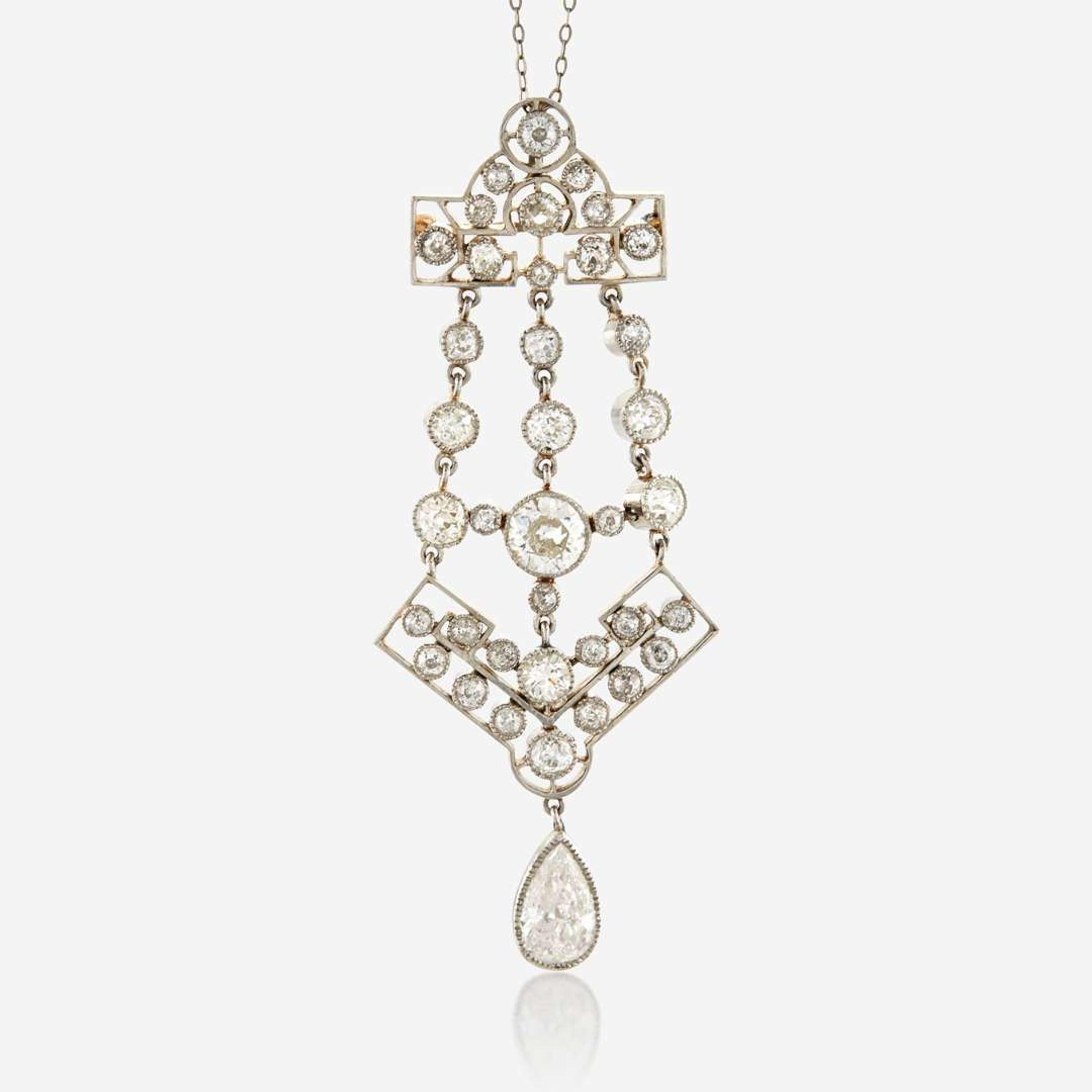 A diamond and platinum topped gold pendant