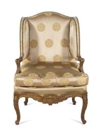 A Louis XV Style Carved and Giltwood Fauteuil à Oreilles