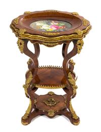 A Napoleon III Gilt Bronze and Porcelain Mounted Fruitwood Table Height 30 x width 22 1/2 x depth 19 inches. — MID-19TH CENTURY