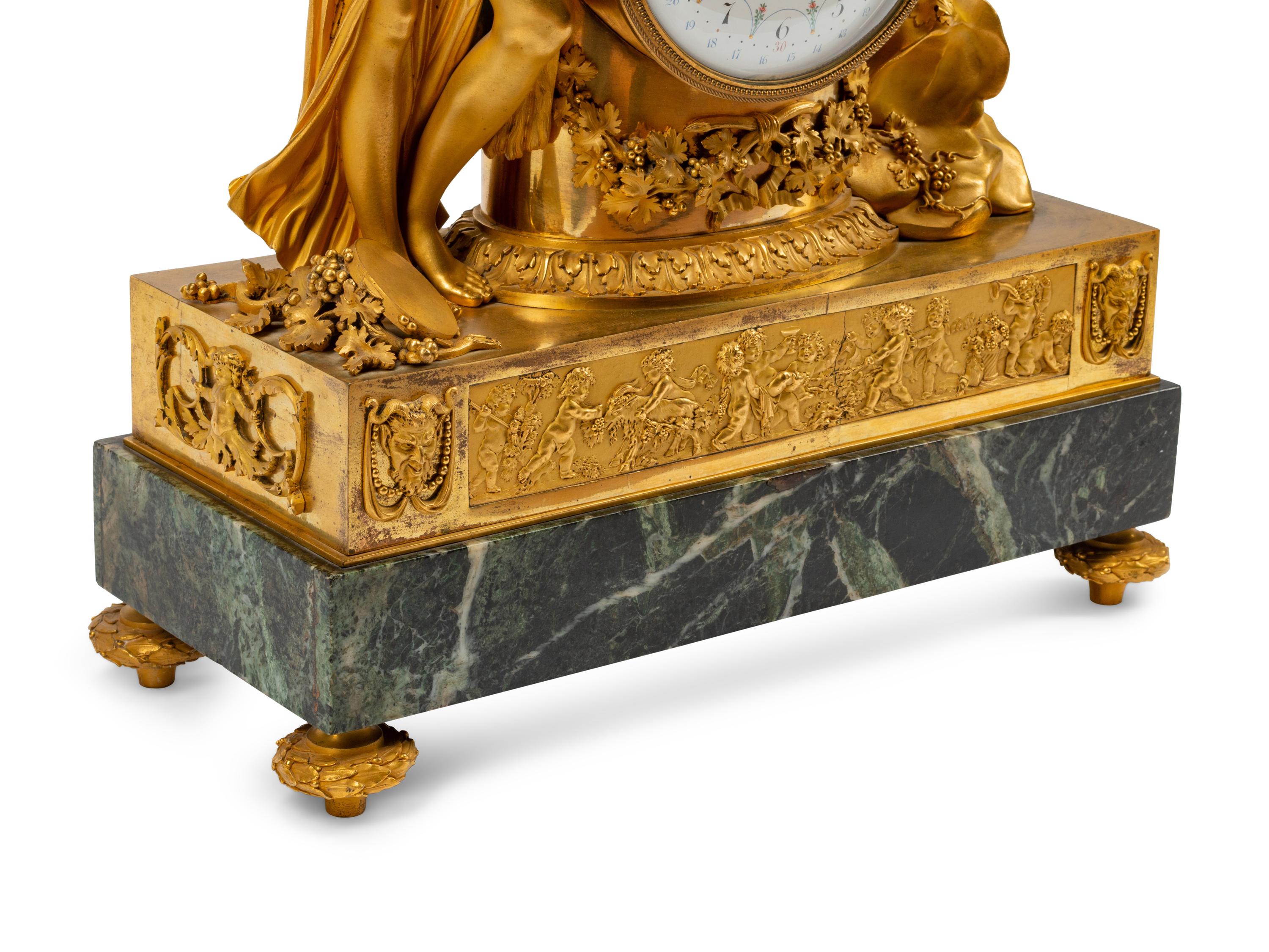 A French Gilt Bronze and Marble Mantel Clock