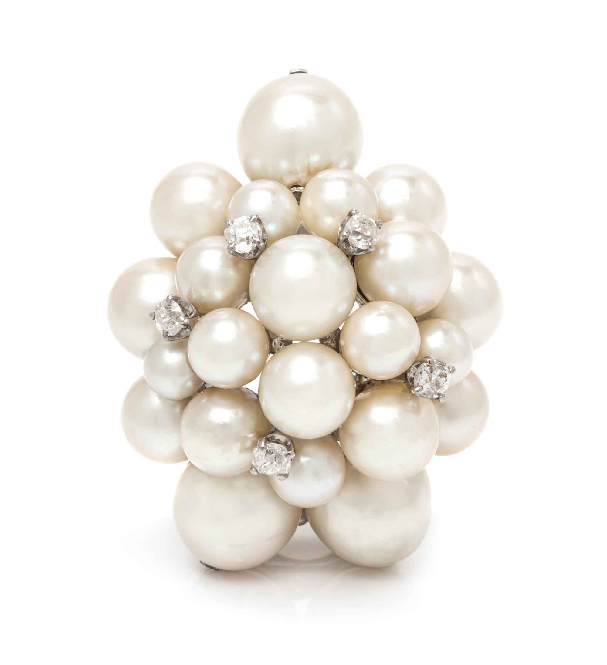 A White Gold, Cutured Pearl and Diamond Brooch, Seaman Schepps, 14.80 dwts.