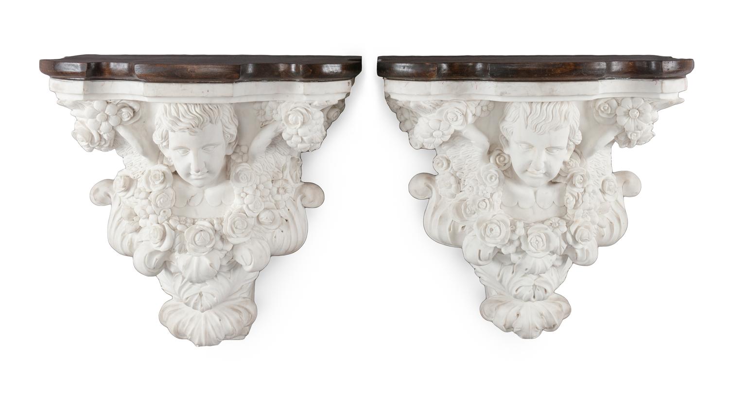 A Pair of Italian Marble Brackets Height 19 x width 20 x depth 11 inches.