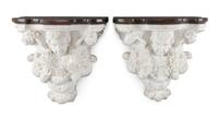 A Pair of Italian Marble Brackets Height 19 x width 20 x depth 11 inches.