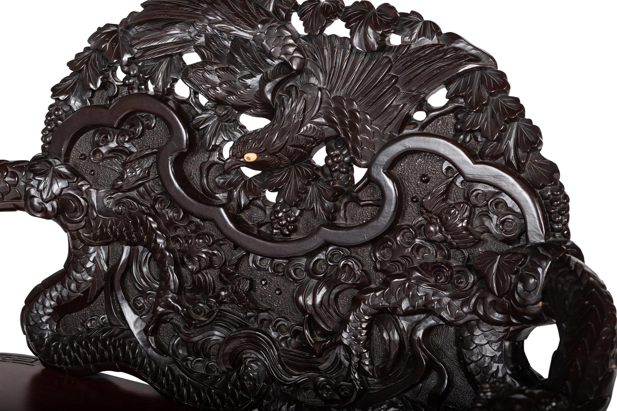 A Japanese Carved Hardwood Armchair, Settee and Marble Inset Stand