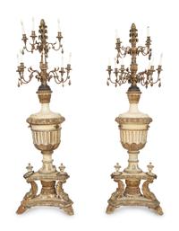 A Pair of Italian Painted and Parcel Gilt Ten-Light Torcheres