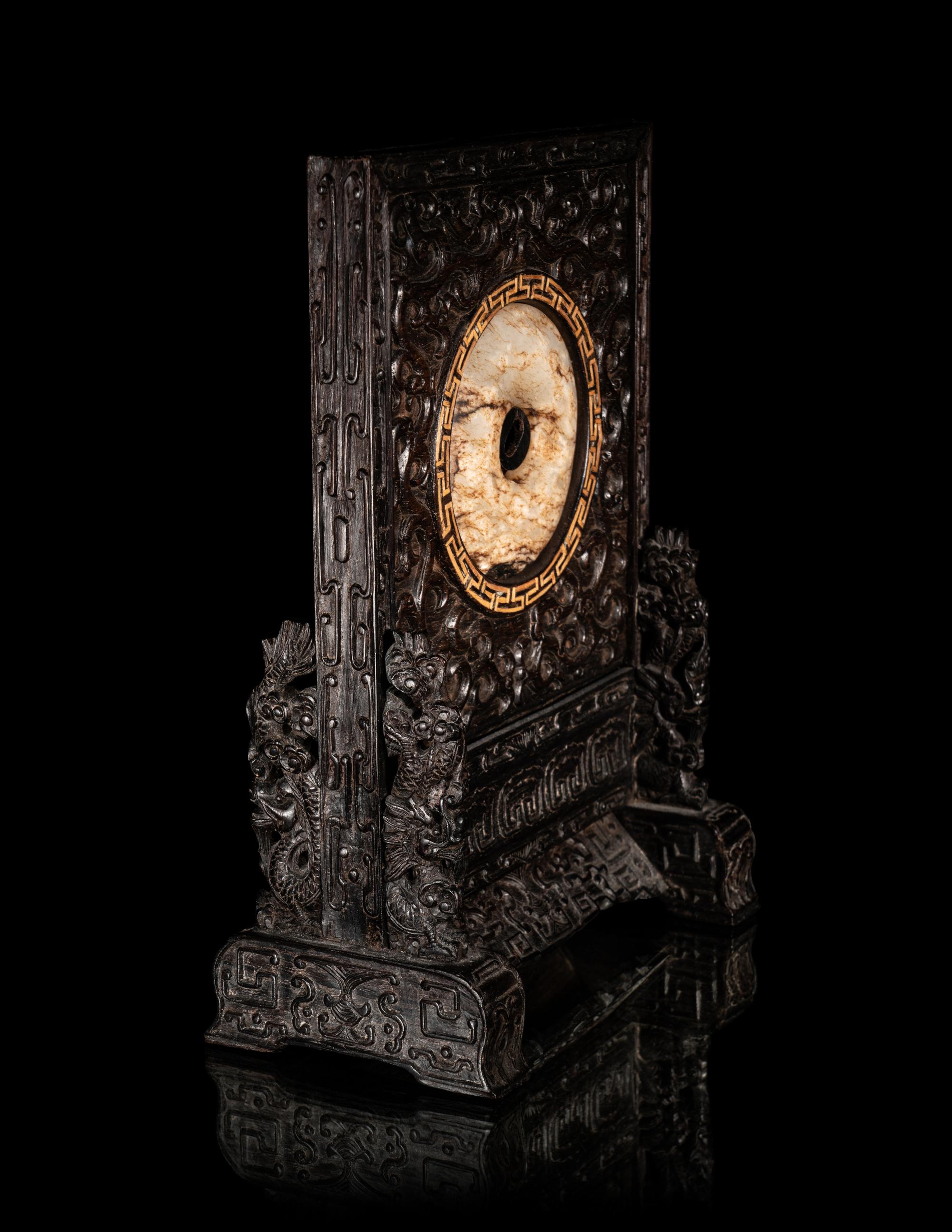 A Chinese Jade Bi Disc Inset Hardwood Table Screen