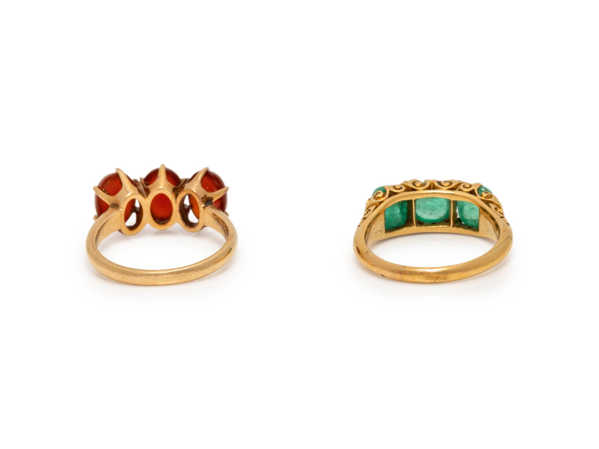 COLLECTION OF YELLOW GOLD, EMERALD, AND CARNELIAN RINGS