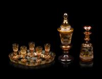 A Collection of Bohemian Amber Cut to Clear Glassware