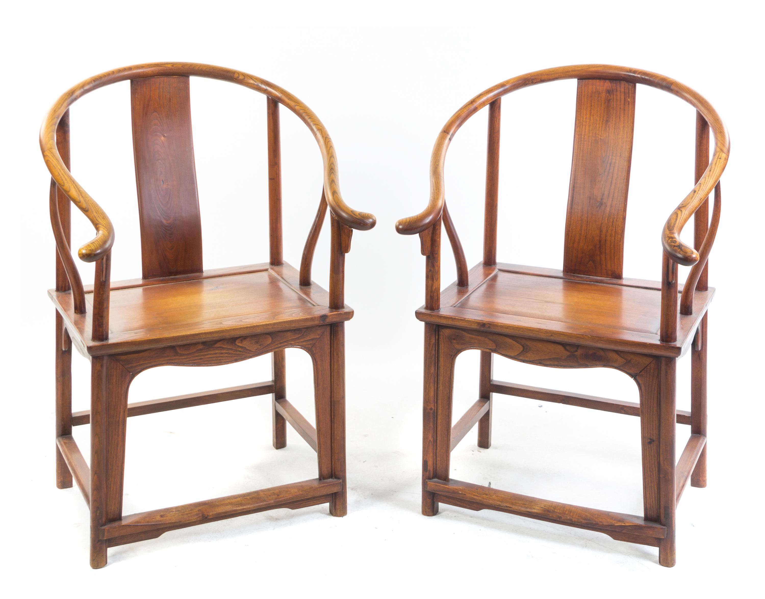 A Pair of Chinese Elm Armchairs Height 39 1/2 inches.