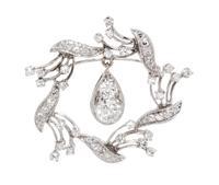 A White Gold and Diamond Pendant/Brooch, 5.10 dwts.