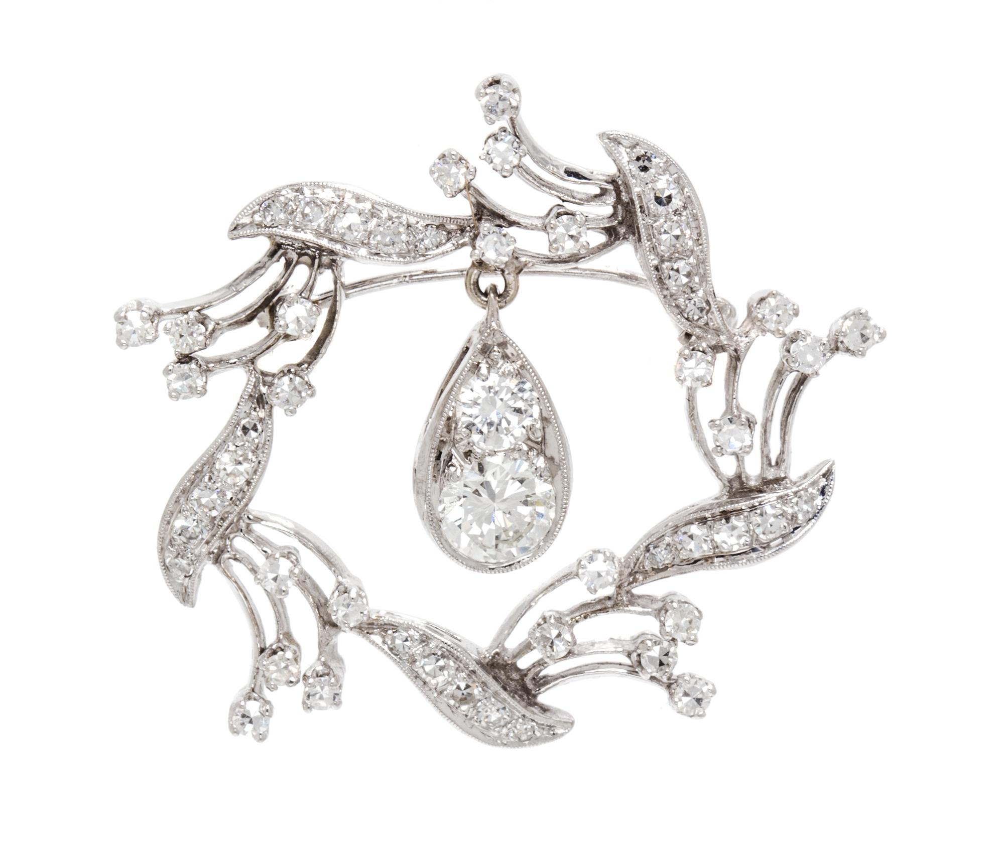A White Gold and Diamond Pendant/Brooch, 5.10 dwts.