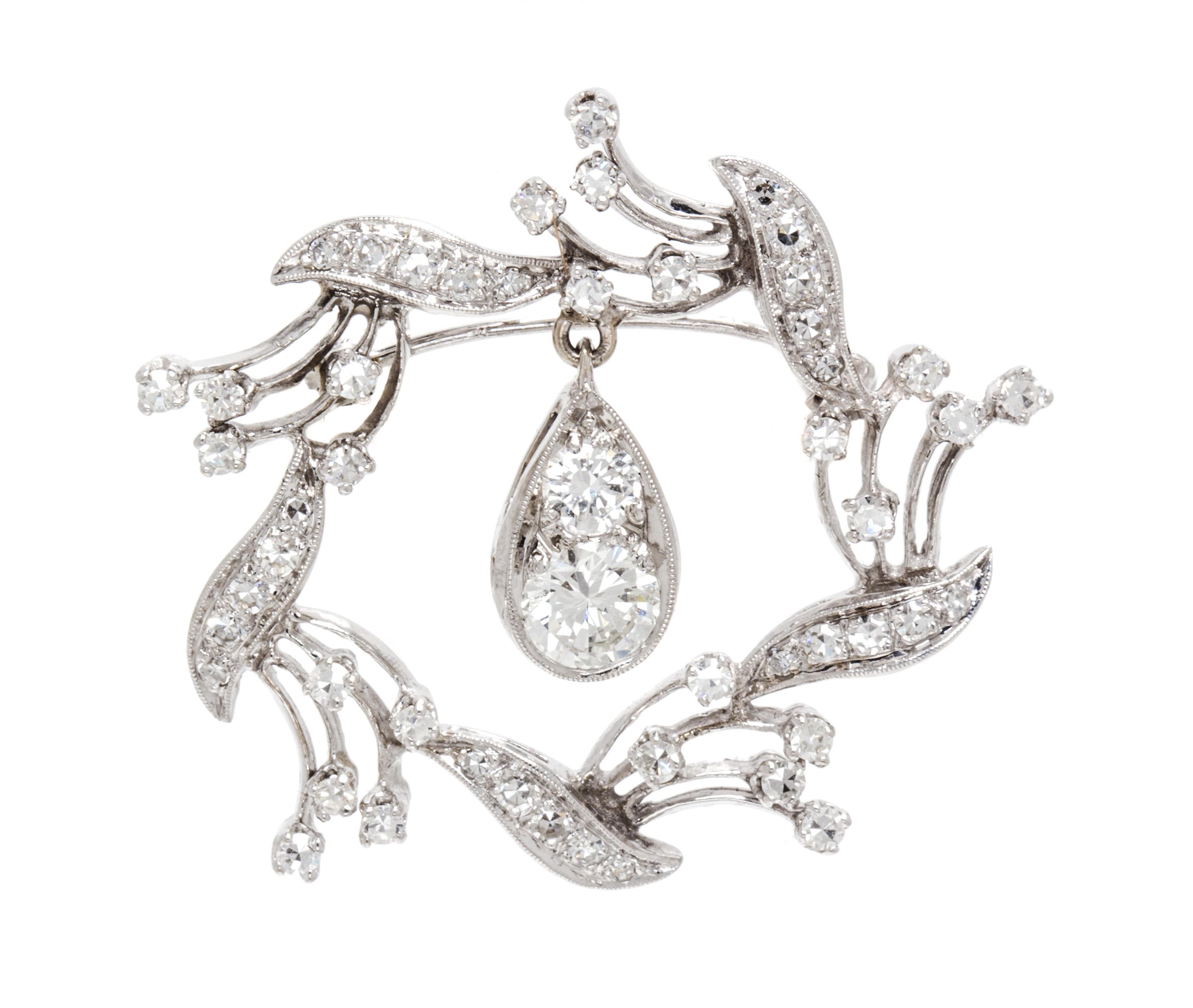 A White Gold and Diamond Pendant/Brooch, 5.10 dwts.