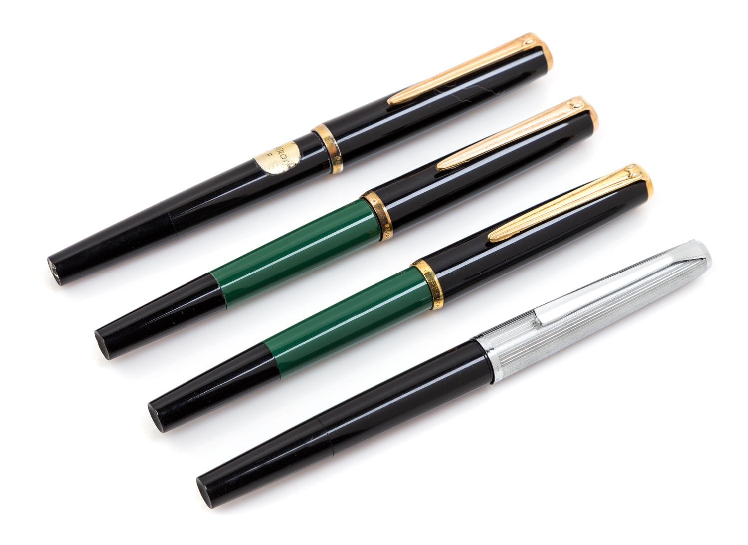 A Collection of Four Pelikan Fountain Pens Length of each 5 1/4 inches.