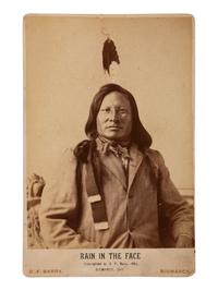 [NATIVE AMERICANS]. Cabinet card of Rain-in-the-Face. Bismarck, ND: D. F. Barry, 1885.