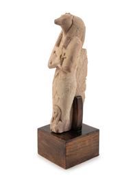 An Egyptian-Style Stucco Figure of Anubis