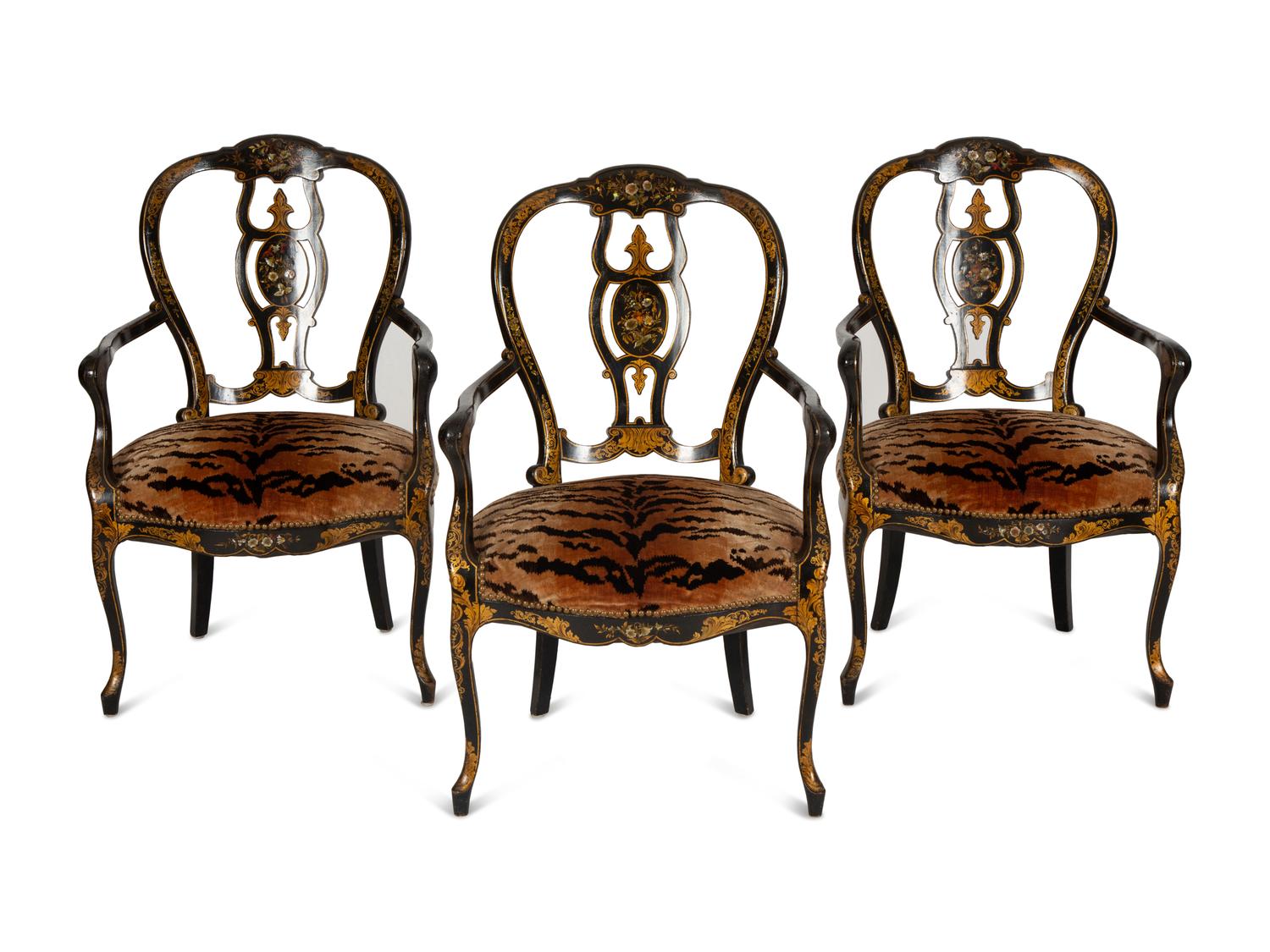 A Set of Three Victorian Ebonized Gilt and Mother of Pearl Chinoiserie Open Armchairs