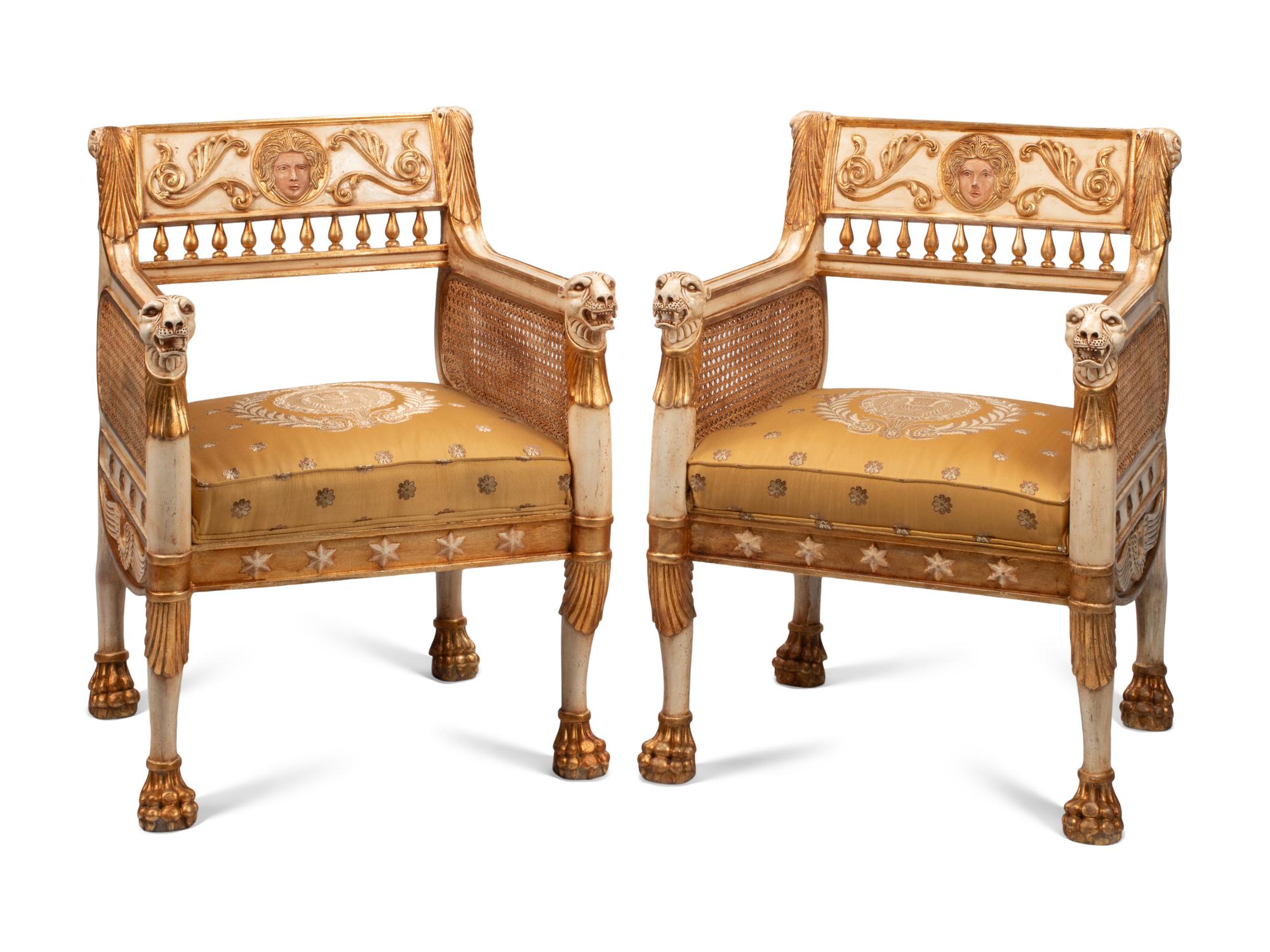 A Pair of Italian Neoclassical Style Painted and Parcel-Gilt Armchairs